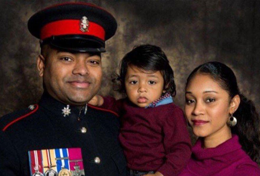 Johnson Beharry with his wife and child 
